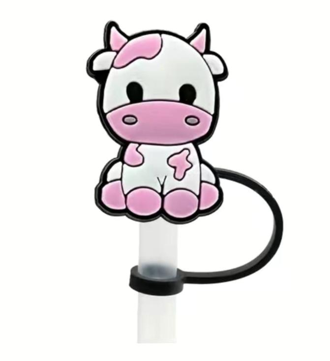 Lindo adorno de paja con forma de vaca