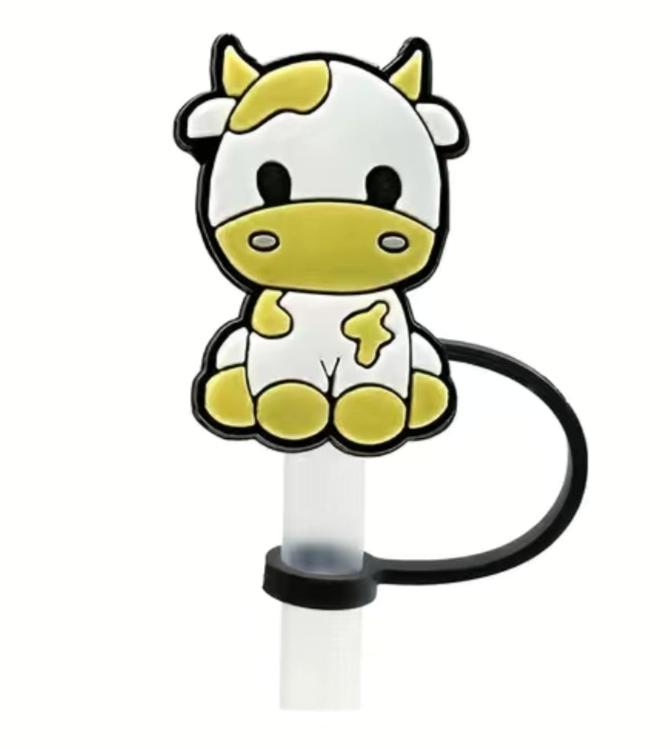 Lindo adorno de paja con forma de vaca