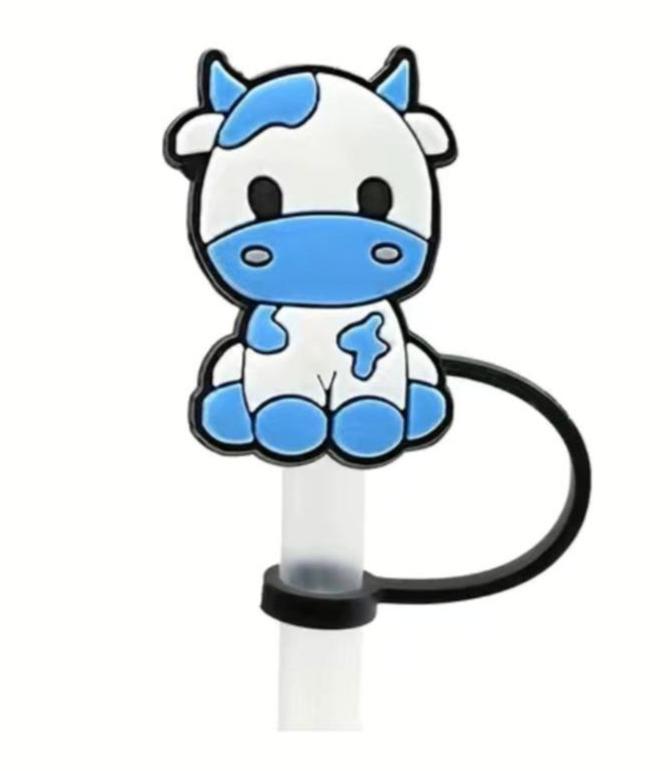 Lindo adorno de paja con forma de vaca